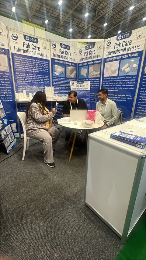 A visitor reviewing brochures with the Pak Care team