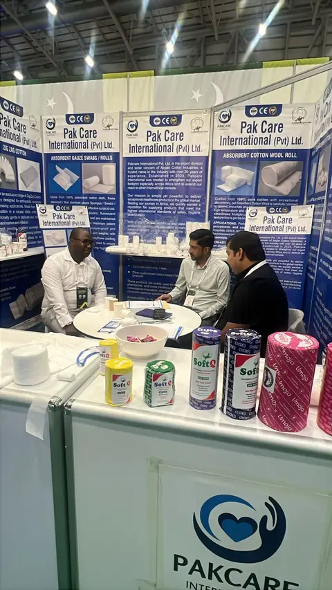 A visitor in conversation with the Pak Care team, SoftQ rolls on the counter