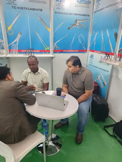 Talking with a visitor at the stand in Nairobi